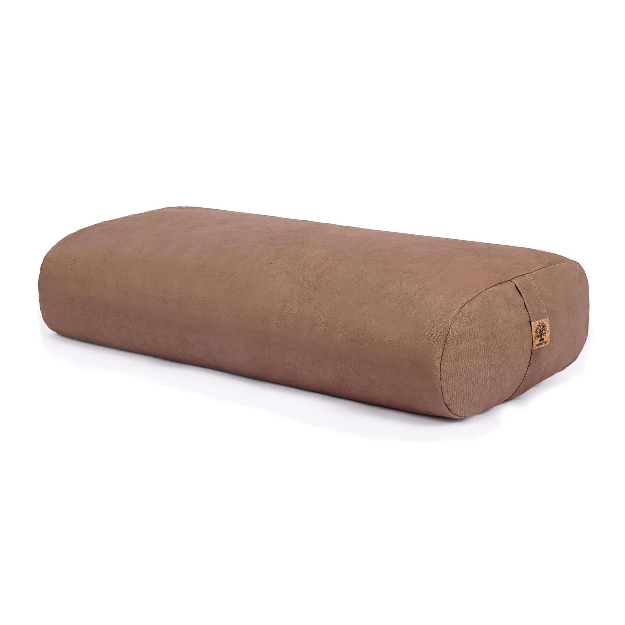 A brown / beige rectangular yoga bolster pillow with a small cork tag on the end, shown on a clean white background