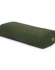 An olive green rectangular bolster pillow with a small brown cork tag on the end, shown on a clean white background