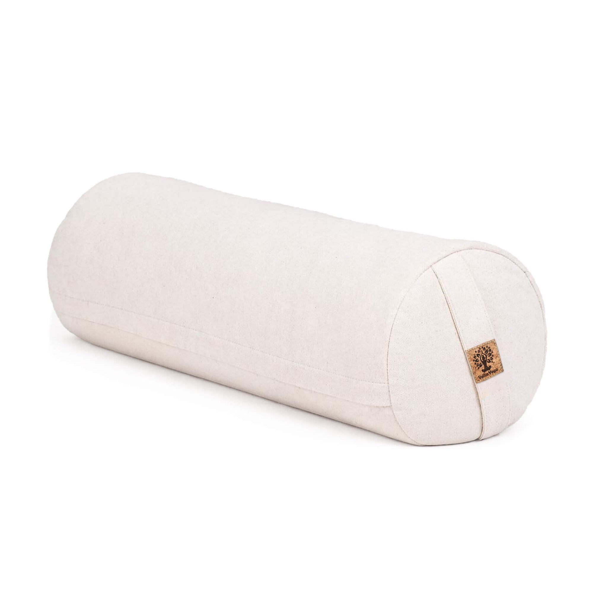 A cylindrical yoga bolster pillow in a natural off-white linen fabric, featuring a small cork patch on one end, set against a plain white background