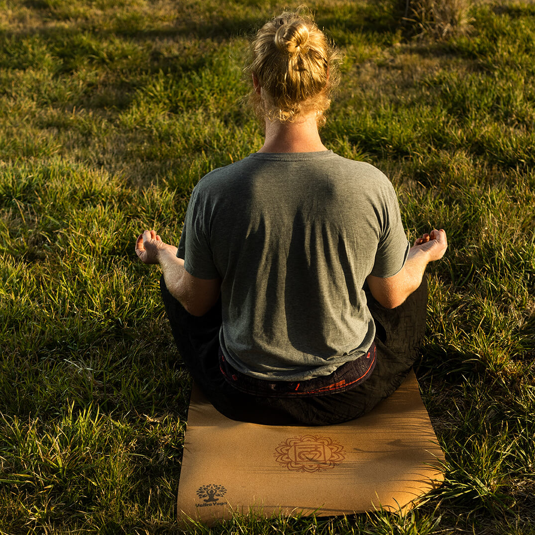 Nick meditating on Chakra Yoga Mat