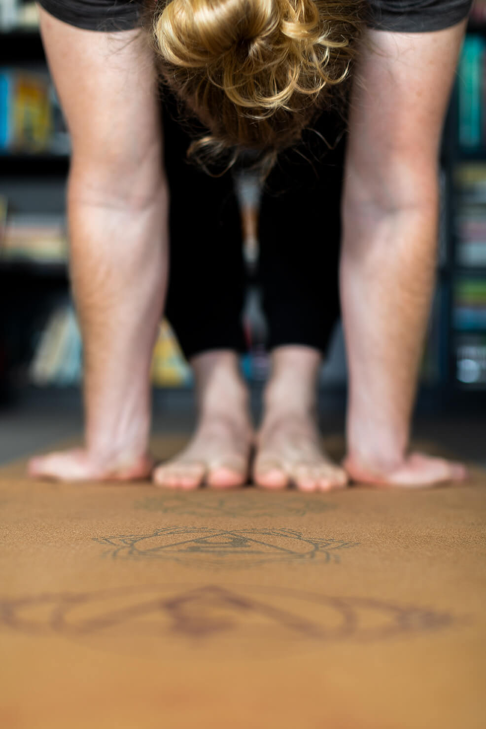 Standing forward fold on Chakra Yoga Mat