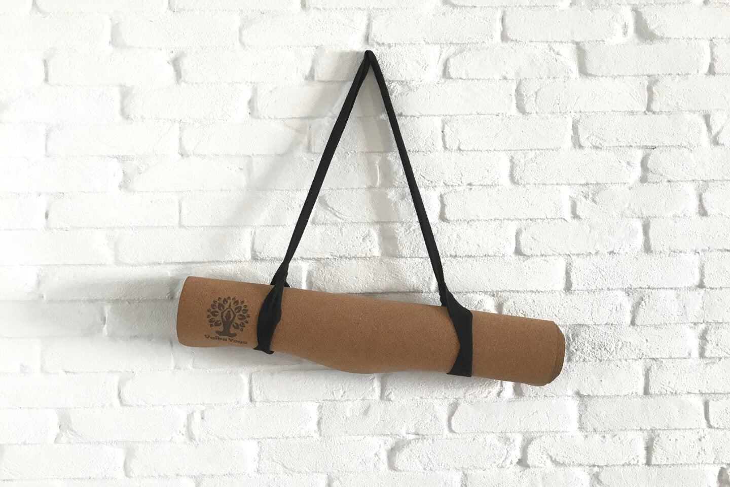 Cork yoga mat in carry strap