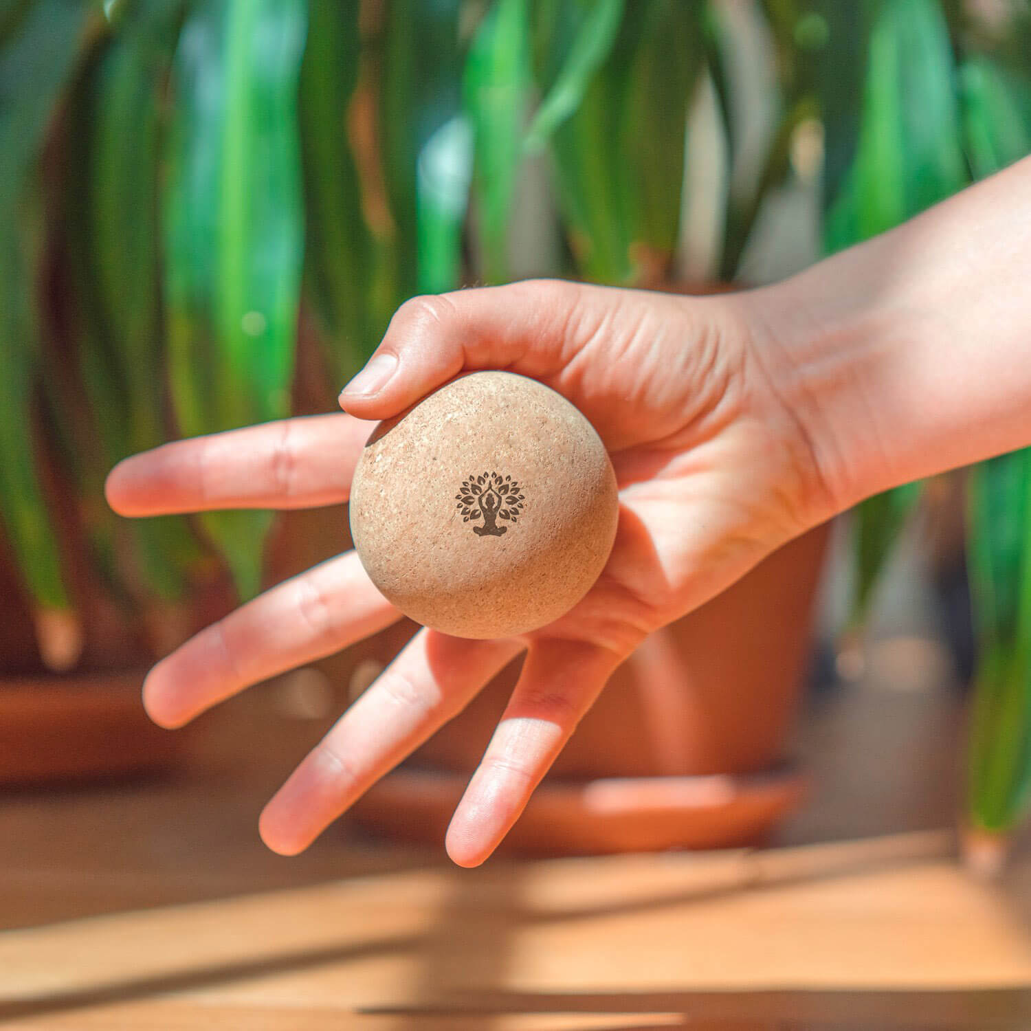 Cork massage ball in hand