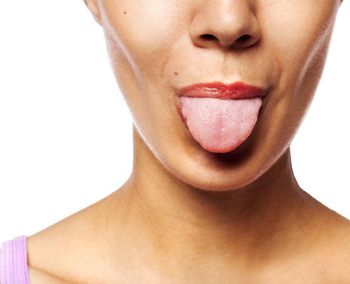 Clean tongue after using tongue scraper